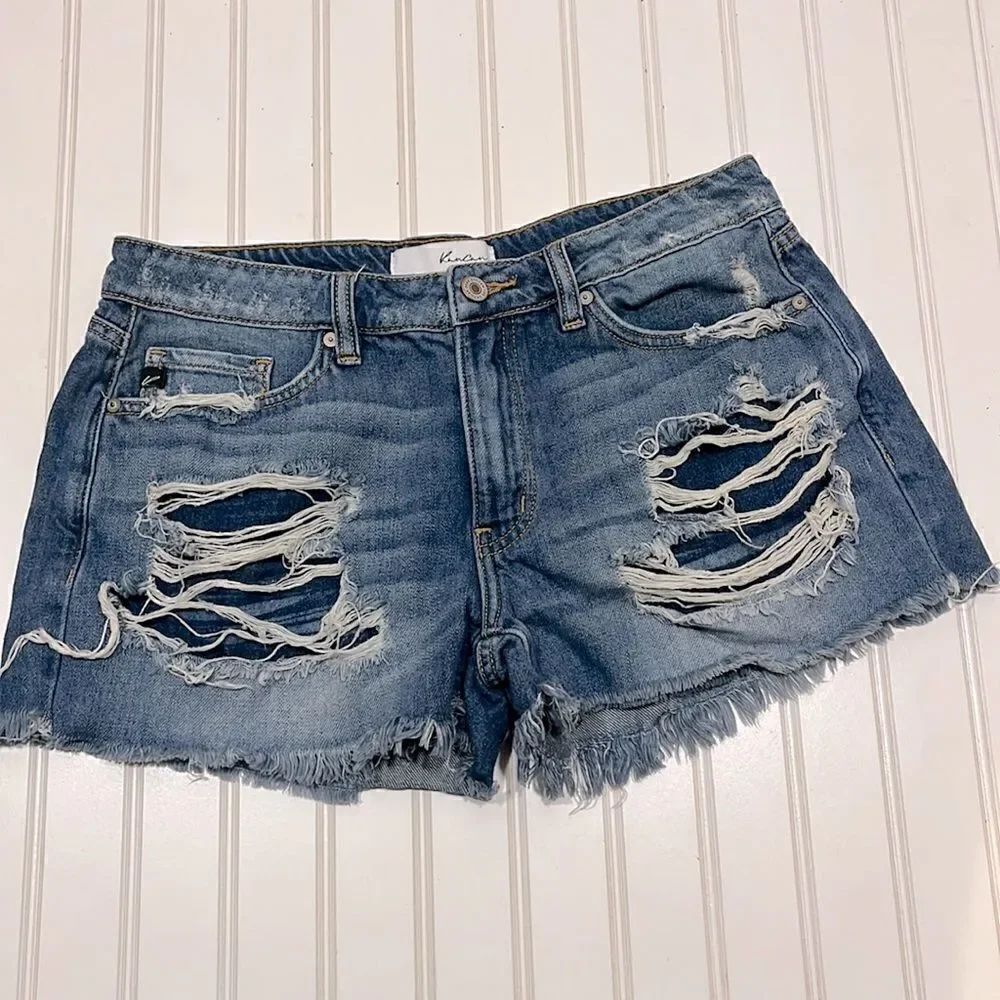 KanCan mid rise distressed raw hem denim shorts